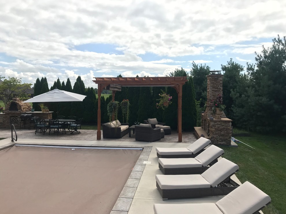 Kansas Paver Patio with Pergola, Fireplace, Outdoor Kitchen, and Pool