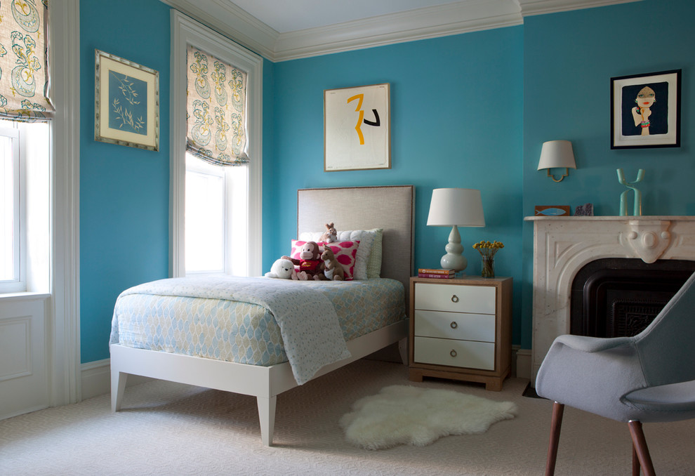 Design ideas for a transitional kids' room in New York with blue walls.