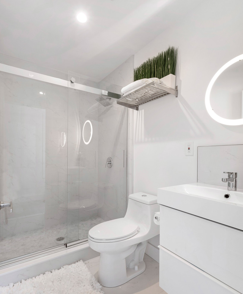 Modern Residential Construction - Alcove bathtub - mid-sized modern 3/4 white tile and ceramic tile ceramic tile, white floor, shiplap ceiling, wall paneling and single-sink alcove bathtub idea in Newark with flat-panel cabinets, white cabinets, a one-piece toilet, white walls, a drop-in sink, granite countertops, white countertops, a niche and a built-in vanity