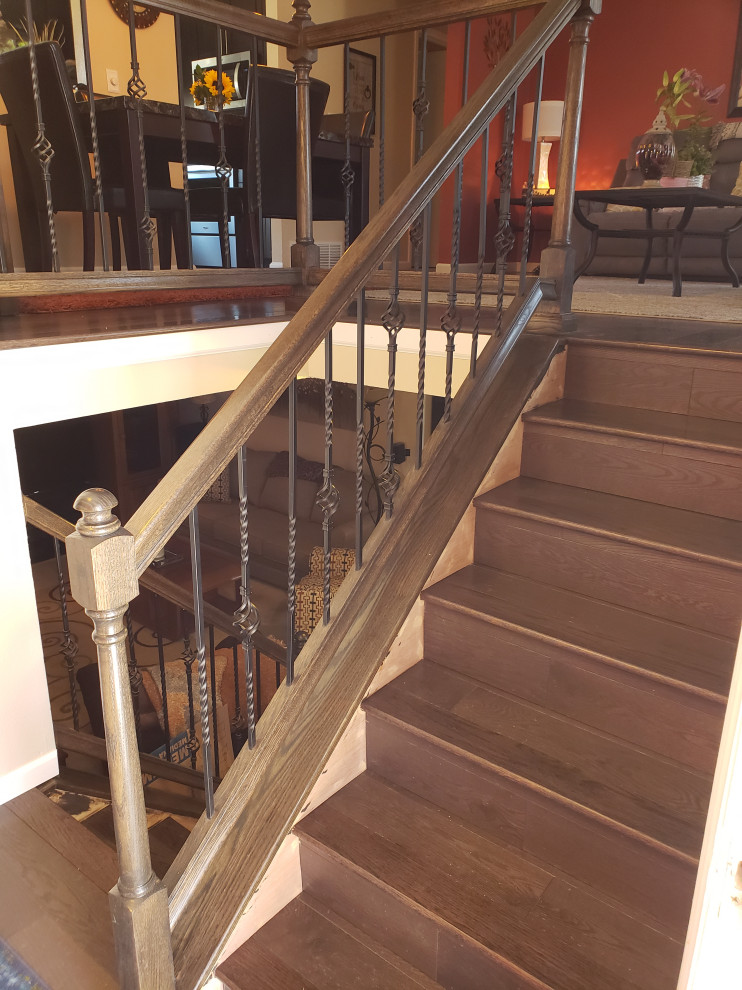Classic Iron Balusters & Dark Wood Staircase Transformation
