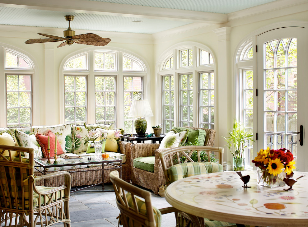 Photo of a traditional sunroom in Chicago with a standard ceiling and grey floor.