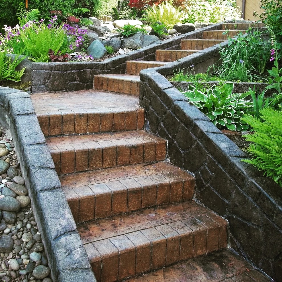 Mid-sized country concrete l-shaped staircase in Portland with concrete risers.