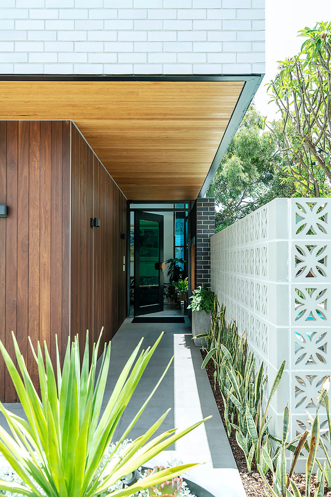 This is an example of a midcentury entryway in Perth.