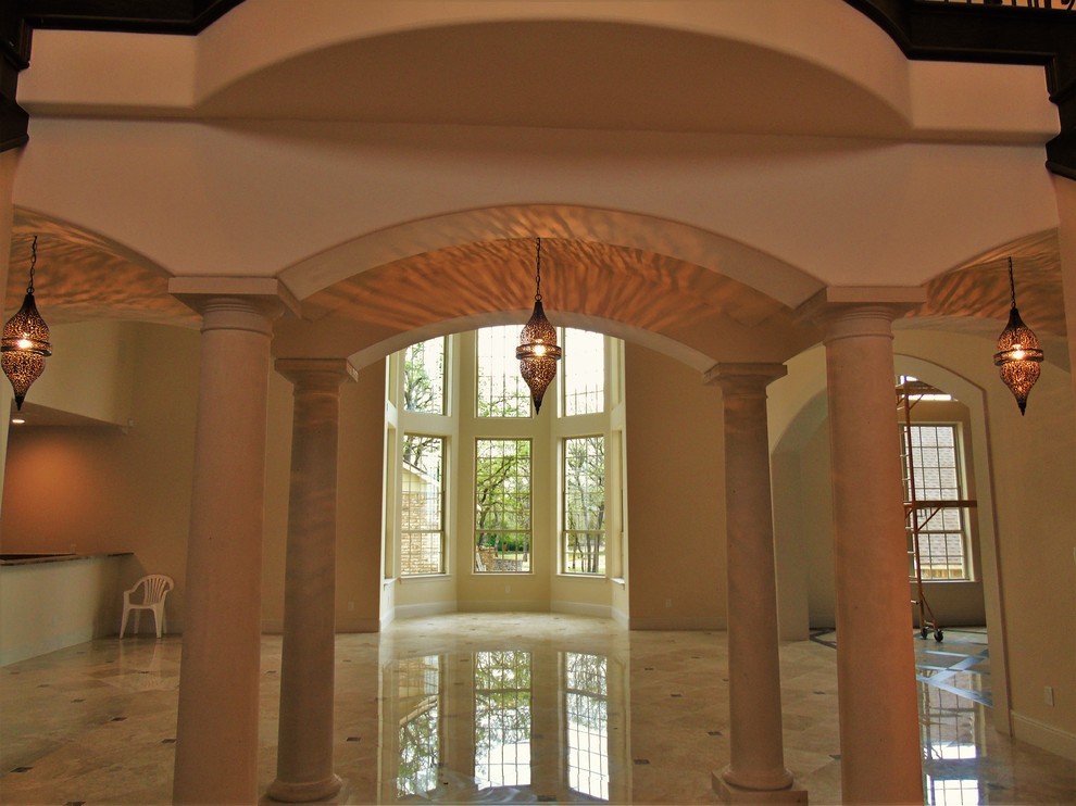 This is an example of a mediterranean entryway in Dallas.