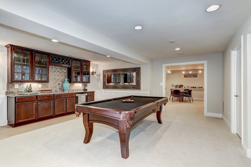 Mid-sized traditional walk-out basement in DC Metro with grey walls, carpet and no fireplace.