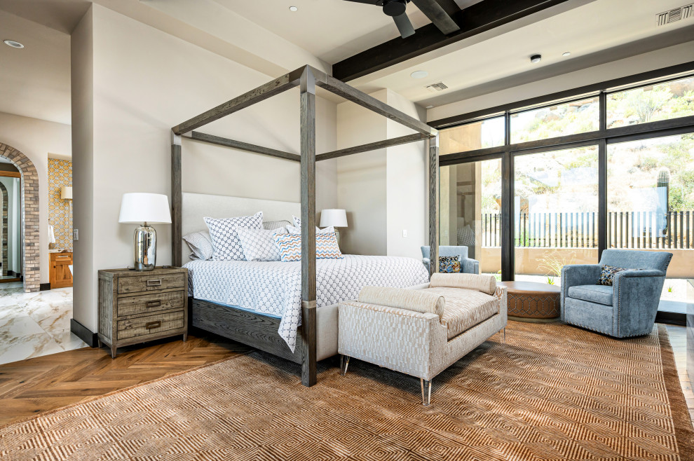 Bedroom - huge southwestern master medium tone wood floor, beige floor and coffered ceiling bedroom idea in Phoenix with white walls, a ribbon fireplace and a tile fireplace