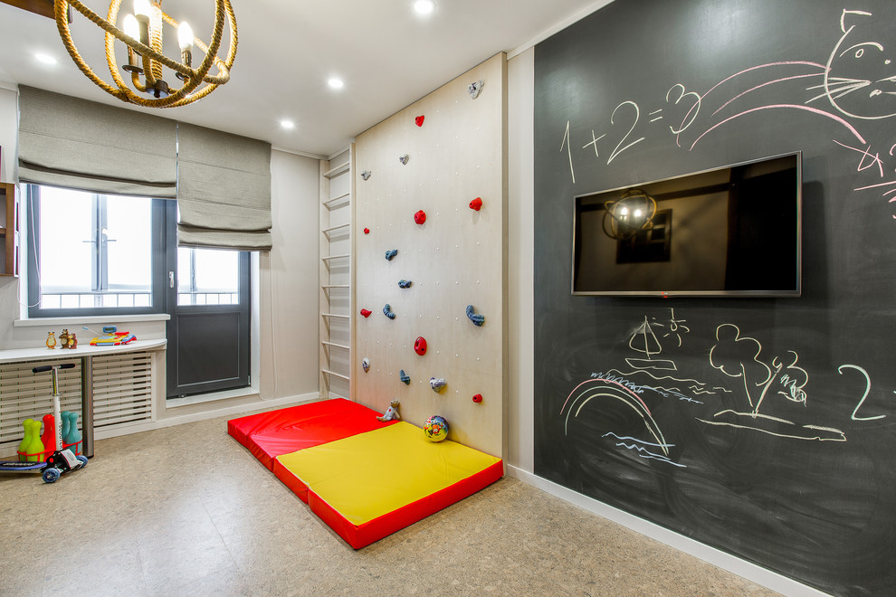 Inspiration for a contemporary kids' playroom for kids 4-10 years old and boys in Other with beige walls.