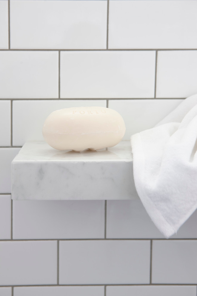 Inspiration for a mid-sized transitional bathroom in Sydney with a vessel sink, flat-panel cabinets, white cabinets, marble benchtops, white tile, subway tile and white walls.