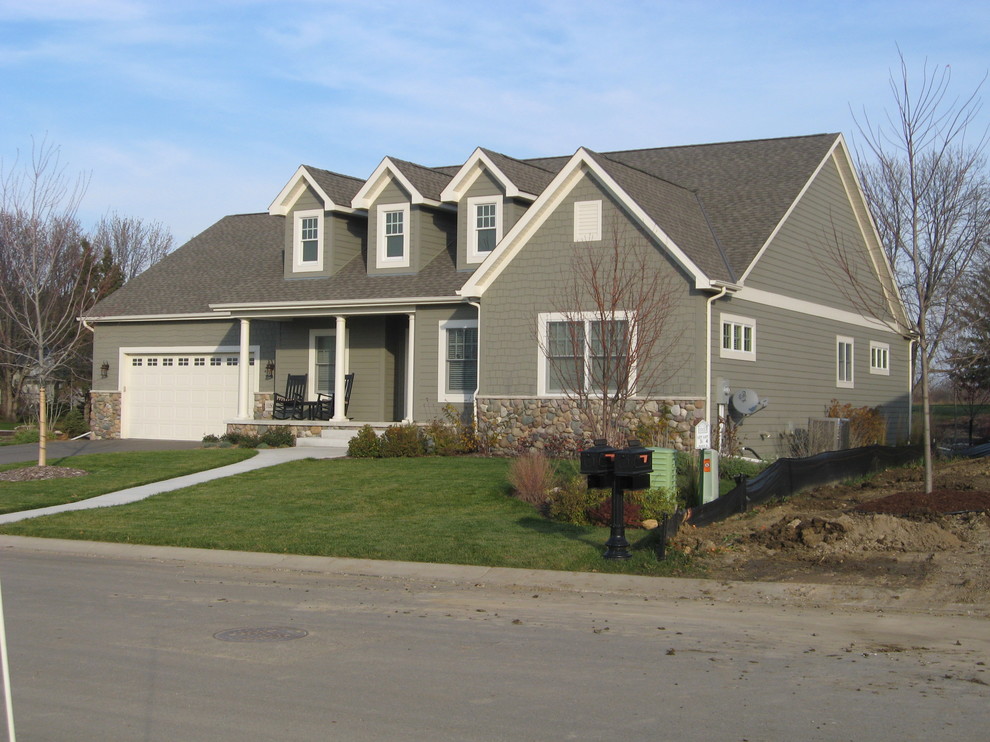 Mid-sized elegant two-story wood gable roof photo in Minneapolis