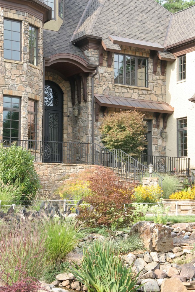 Mountain style home design photo in Raleigh