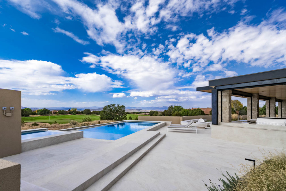 Inspiration for a contemporary pool remodel in Albuquerque