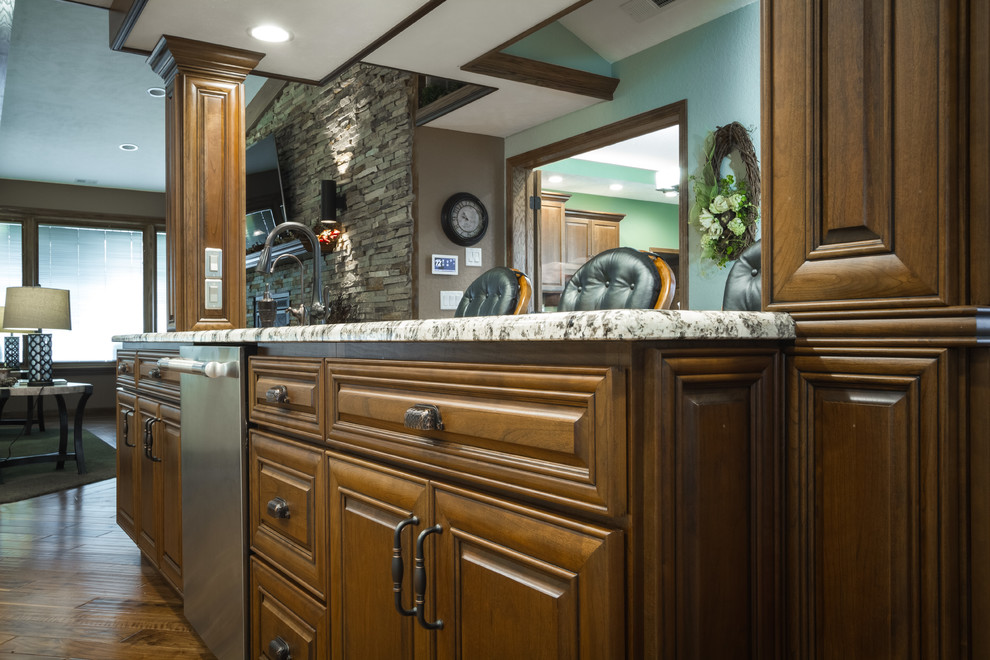 Eat-in kitchen - large transitional l-shaped eat-in kitchen idea with two islands