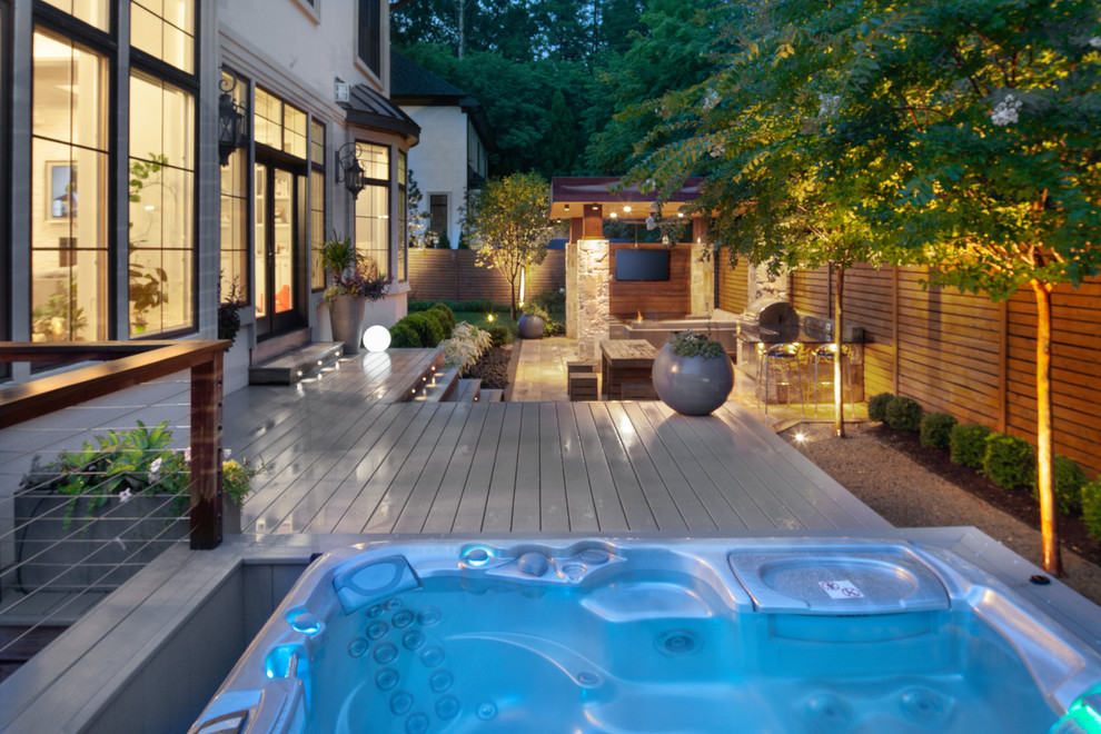 This is an example of a small backyard garden in DC Metro with natural stone pavers.