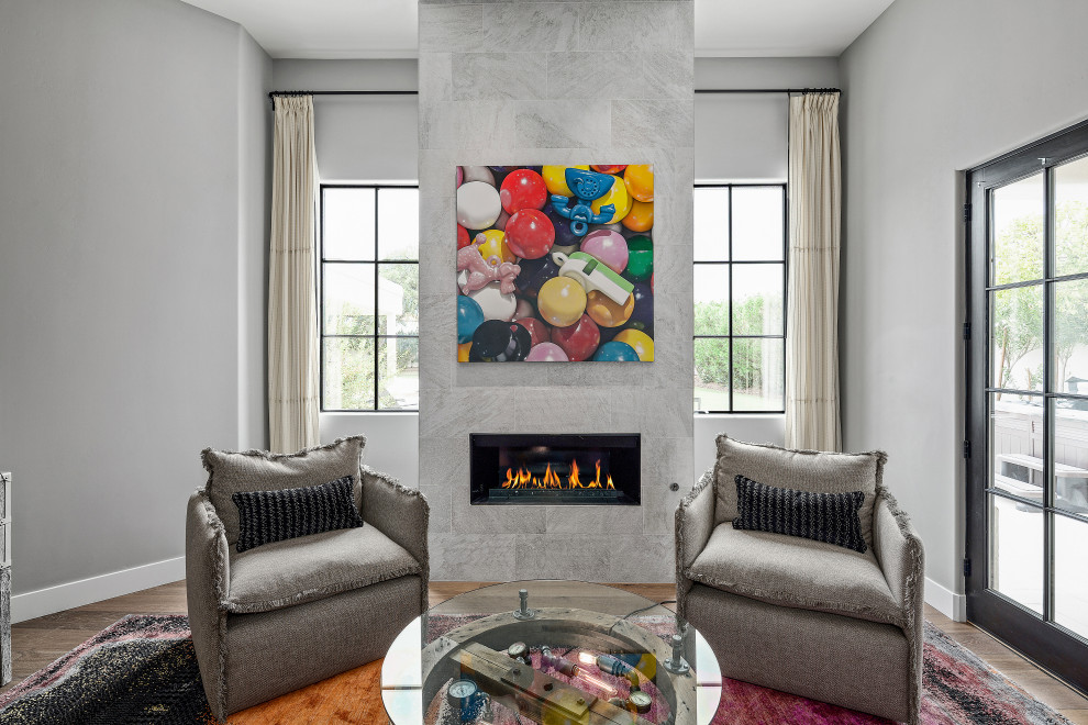 Example of a transitional home design design in Phoenix