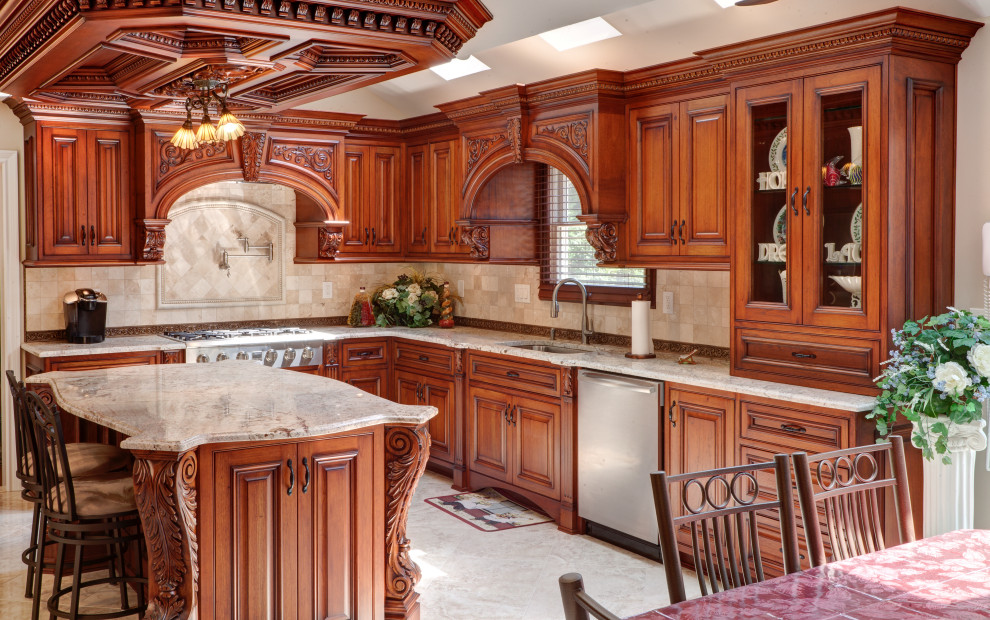 Large tuscan u-shaped coffered ceiling eat-in kitchen photo in New York with an integrated sink, shaker cabinets, brown cabinets, quartz countertops, beige backsplash, quartz backsplash, an island and beige countertops
