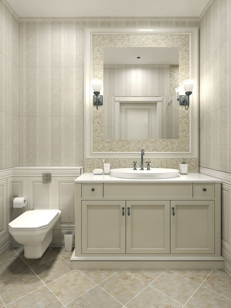 Inspiration for a mid-sized transitional 3/4 mosaic tile limestone floor alcove shower remodel in Denver with shaker cabinets, white cabinets, a one-piece toilet, a vessel sink and solid surface countertops