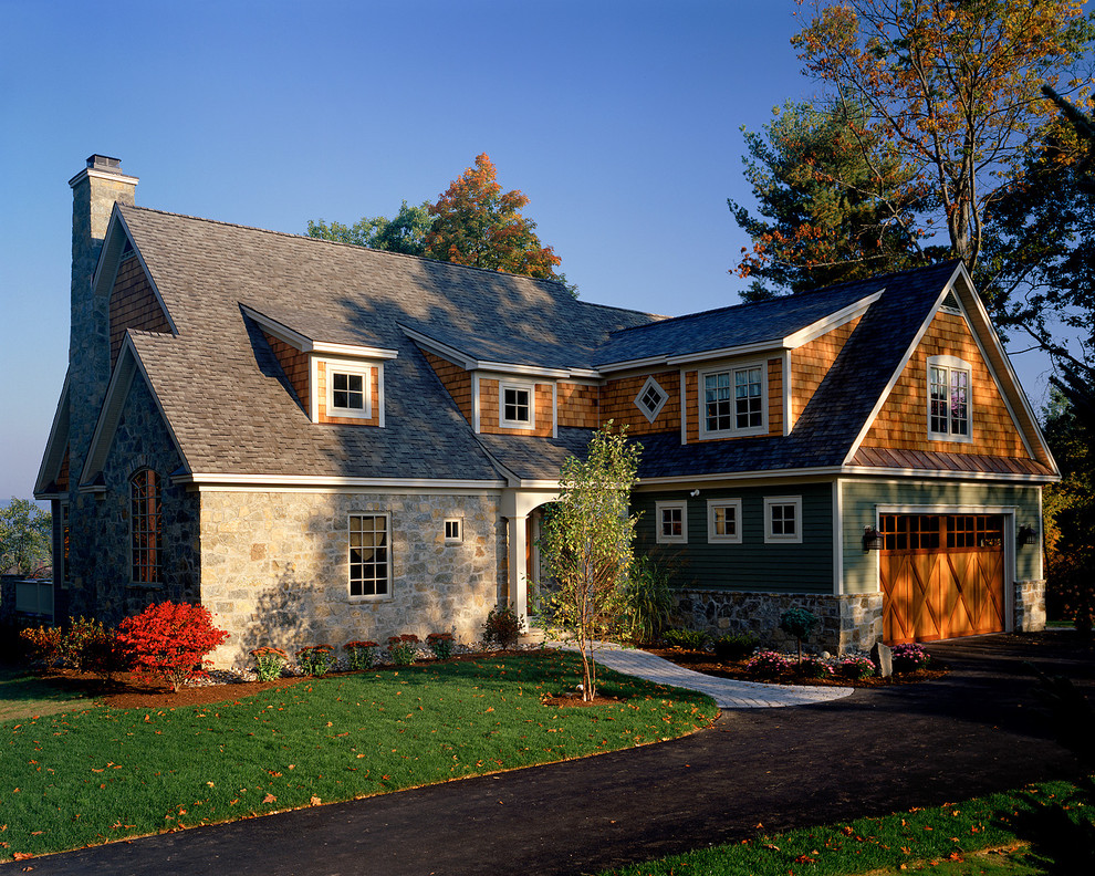 Design ideas for a traditional exterior in New York with wood siding.