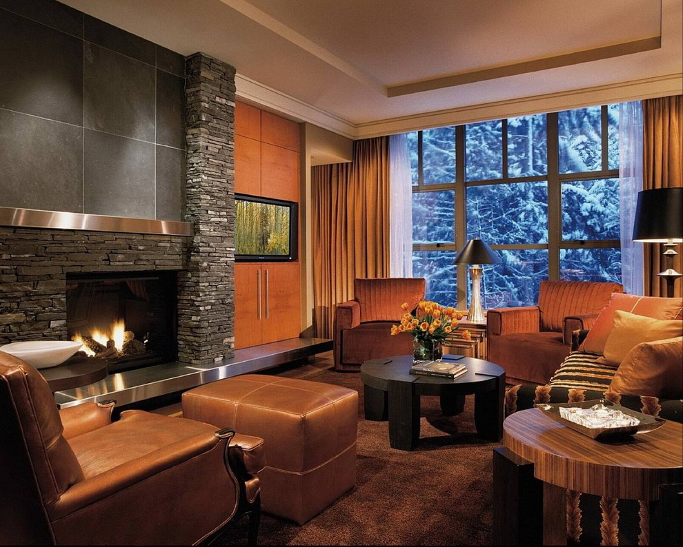 Inspiration for a contemporary family room in Vancouver with a stone fireplace surround.