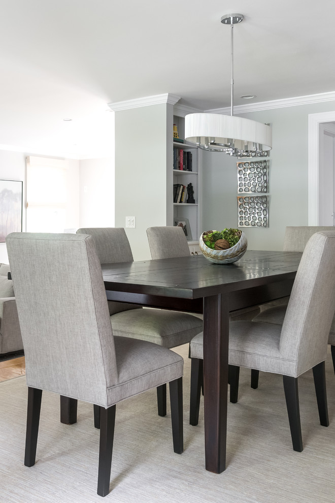 This is an example of a mid-sized transitional open plan dining in Boston with grey walls, medium hardwood floors, no fireplace and brown floor.