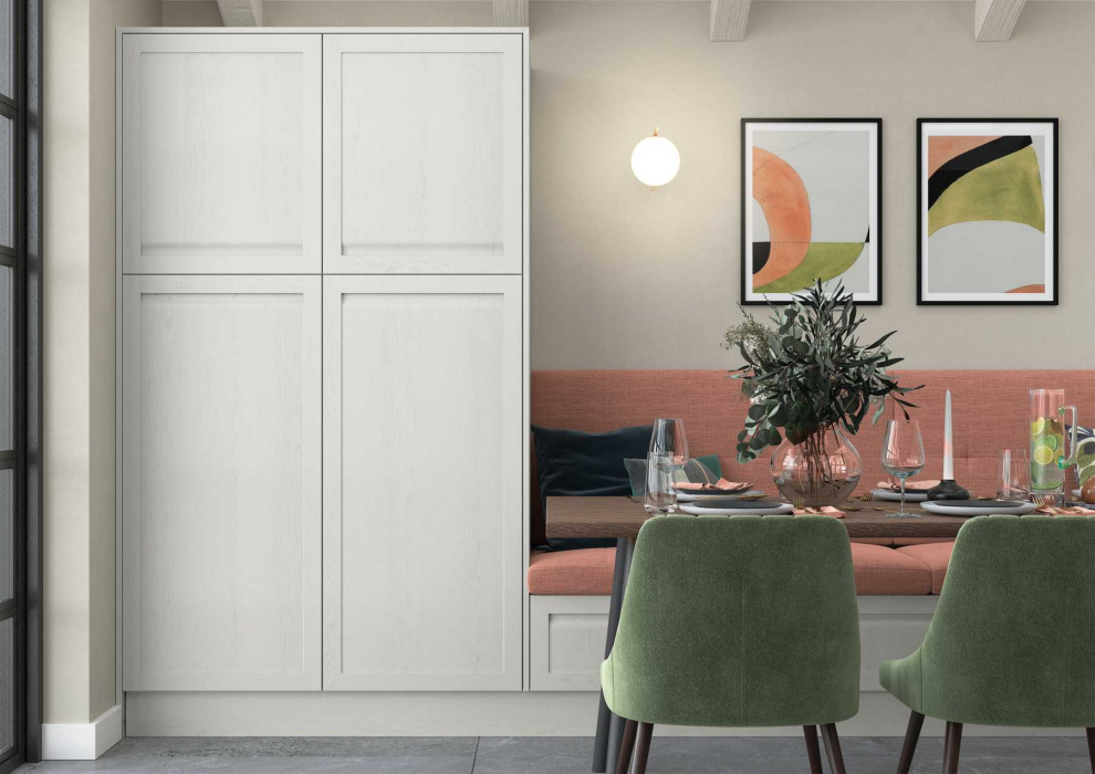 Design ideas for a medium sized contemporary single-wall open plan kitchen in Other with a built-in sink, shaker cabinets, green cabinets, composite countertops, orange splashback, brick splashback, black appliances, an island and white worktops.