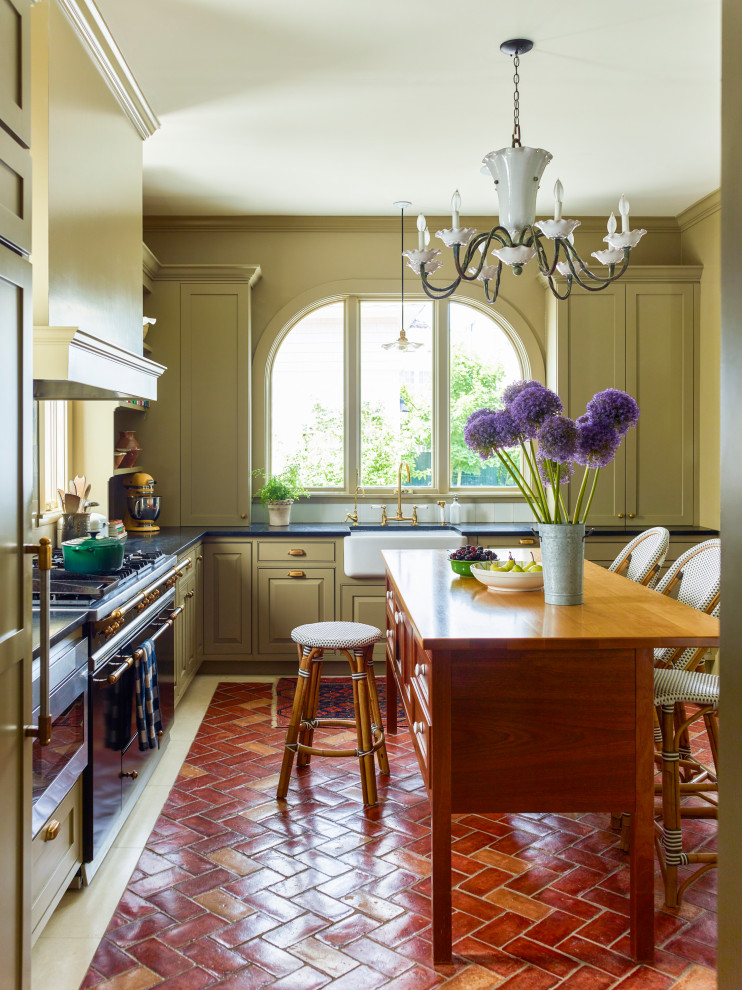 Larchmont Victorian - A khaki-colored Victorian kitchen with plain Dutch Delft tile backsplash and terra cotta brick floors. Vintage adorable chandelier!