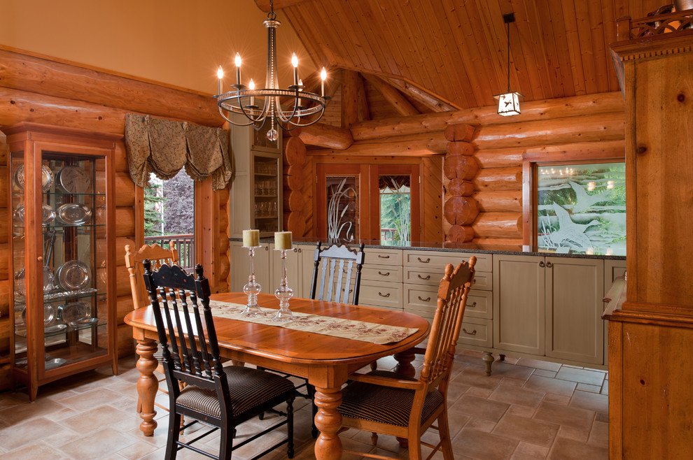 Inspiration for a country dining room in Portland with brown walls.