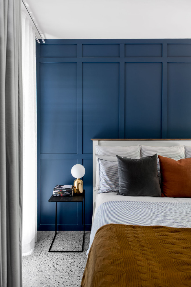 Inspiration for a mid-sized contemporary master bedroom in Brisbane with blue walls, concrete floors, grey floor and decorative wall panelling.