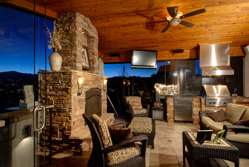 Sunroom - large transitional terra-cotta tile sunroom idea in Denver with a standard fireplace, a stone fireplace and a standard ceiling