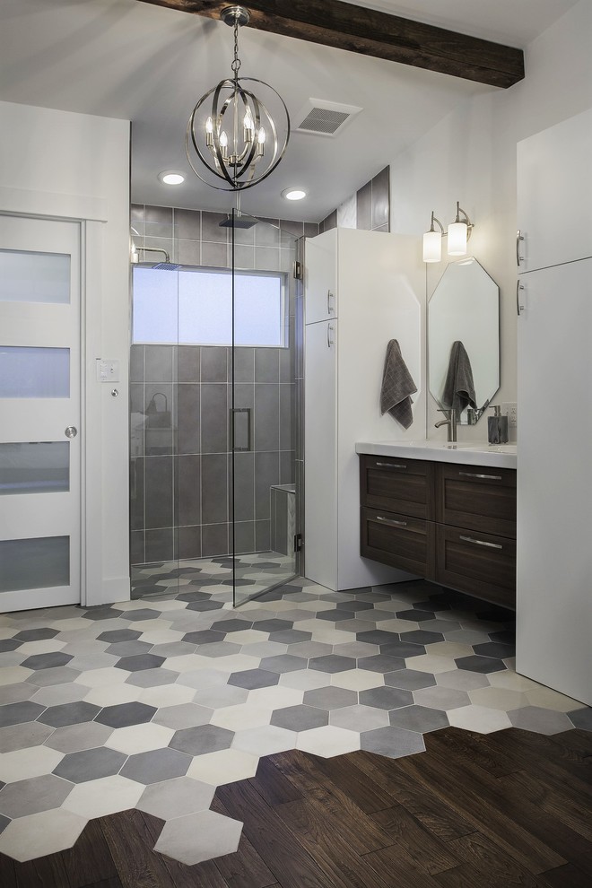 Example of a transitional bathroom design in Denver