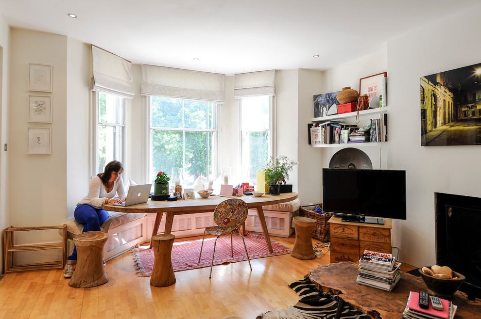 Mid-sized eclectic home design photo in London