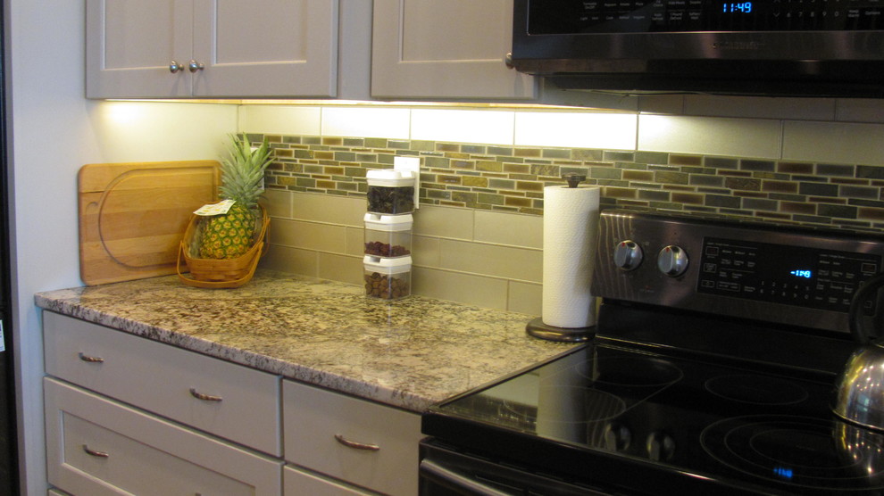 Example of a kitchen design in Baltimore with black appliances