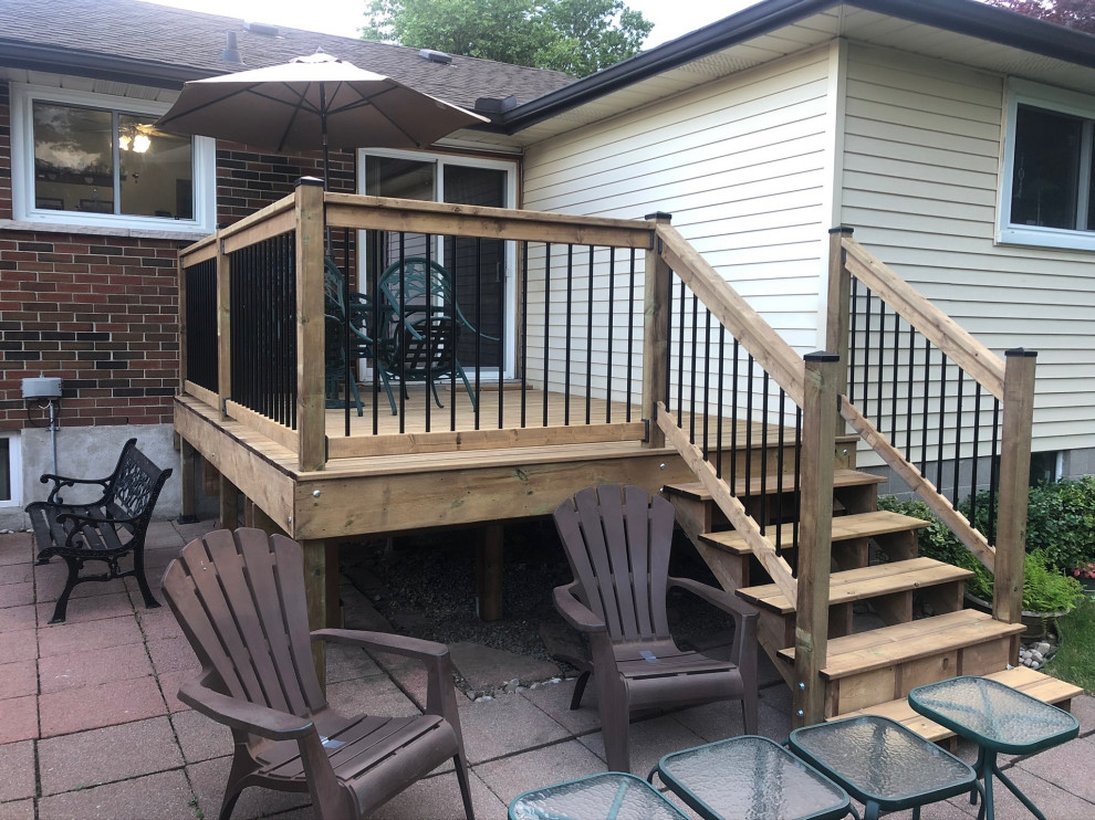 Deck - mid-sized backyard deck idea in Toronto with no cover