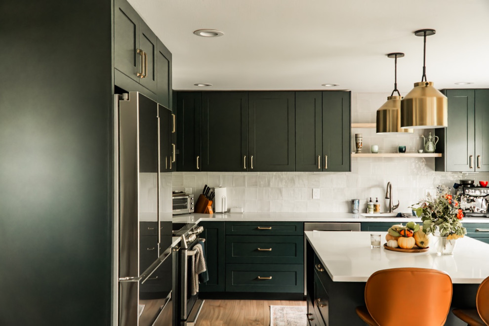 Inspiration for a large contemporary l-shaped light wood floor and beige floor kitchen remodel in Seattle with shaker cabinets, turquoise cabinets, quartzite countertops, white backsplash, ceramic backsplash, stainless steel appliances, an island and white countertops