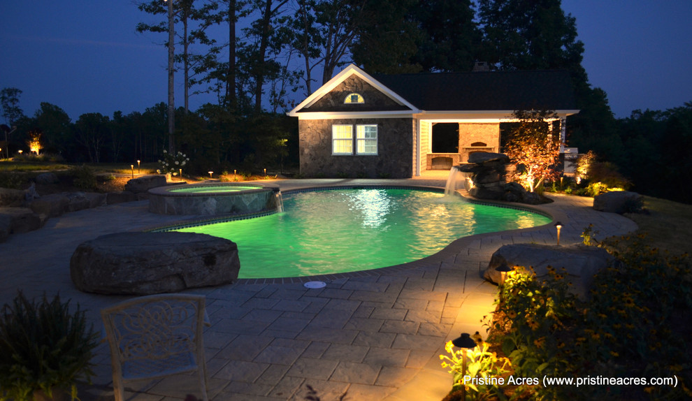 Inspiration for a huge transitional backyard concrete paver and custom-shaped natural pool fountain remodel in DC Metro