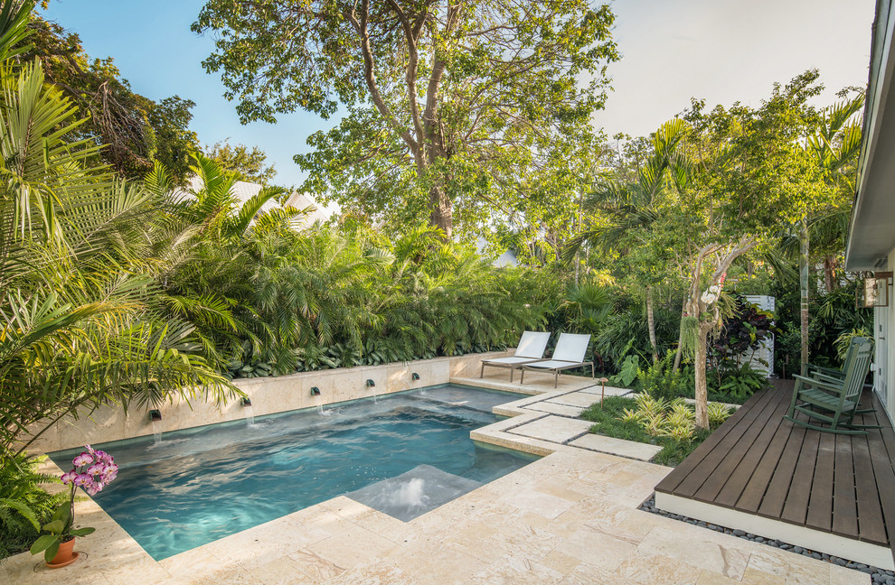 Design ideas for a small tropical home design in Miami.