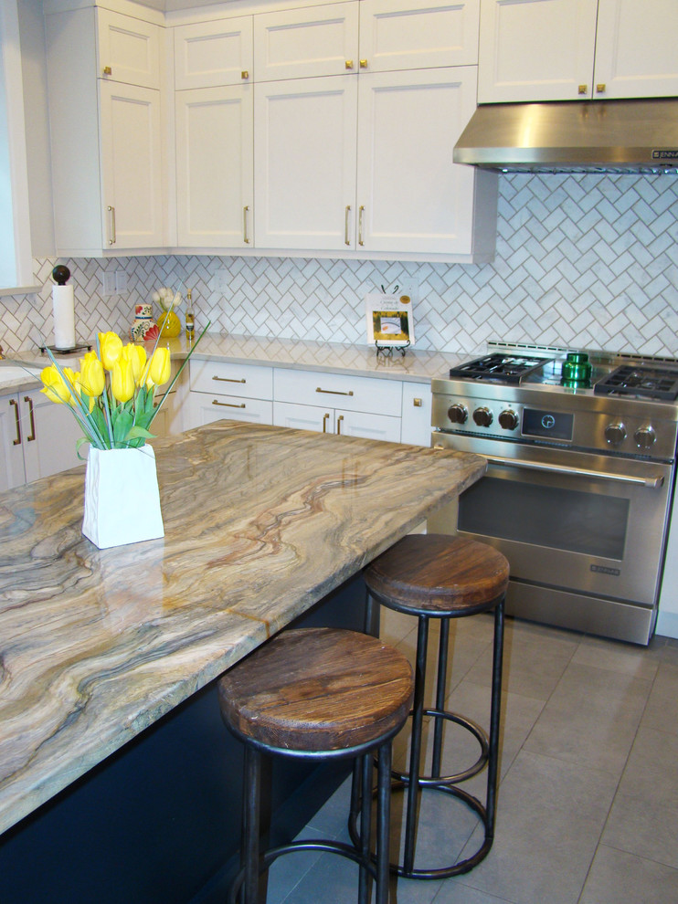 Eat-in kitchen - large transitional u-shaped ceramic tile and gray floor eat-in kitchen idea in Denver with a double-bowl sink, recessed-panel cabinets, white cabinets, granite countertops, white backsplash, marble backsplash, stainless steel appliances, an island and multicolored countertops