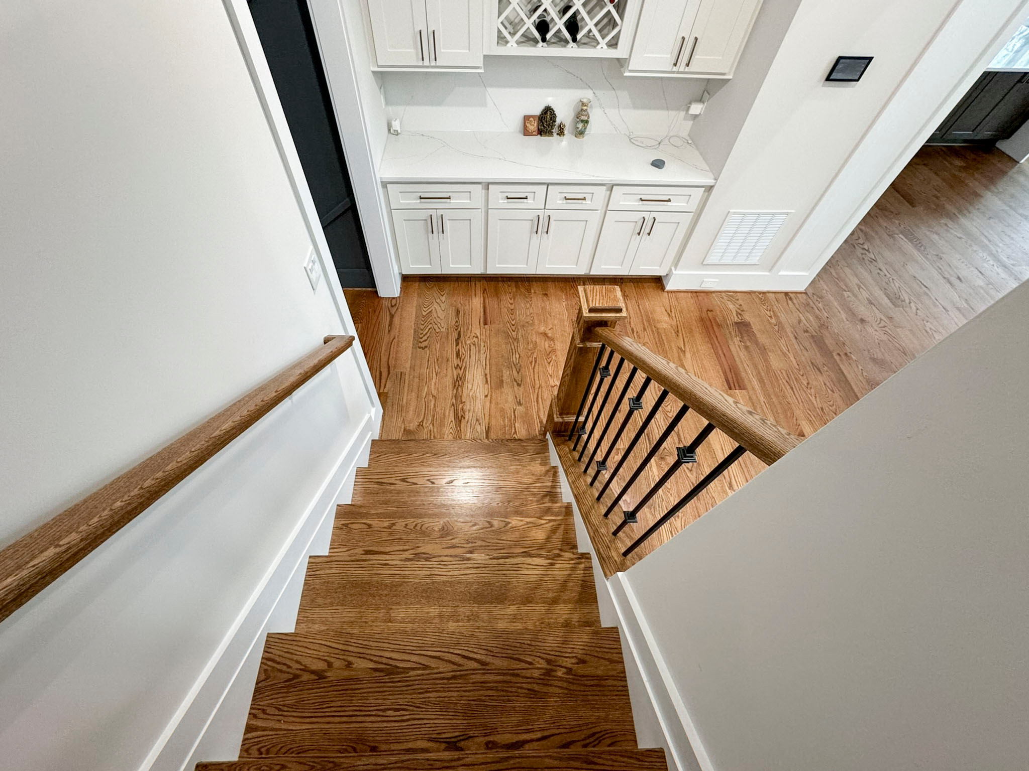 117_Distinct Oak Staircase with Iron Balusters & Oak Rail Profile, Chantilly VA