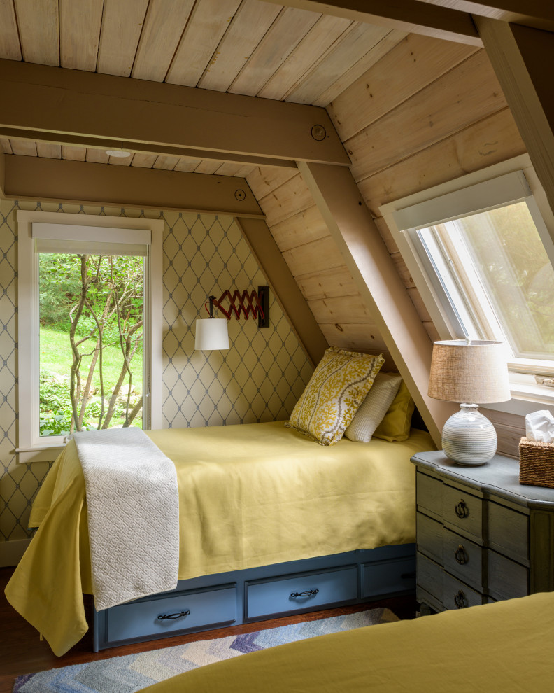 Inspiration for a country guest bedroom in Other with exposed beam, wallpaper and multi-coloured walls.