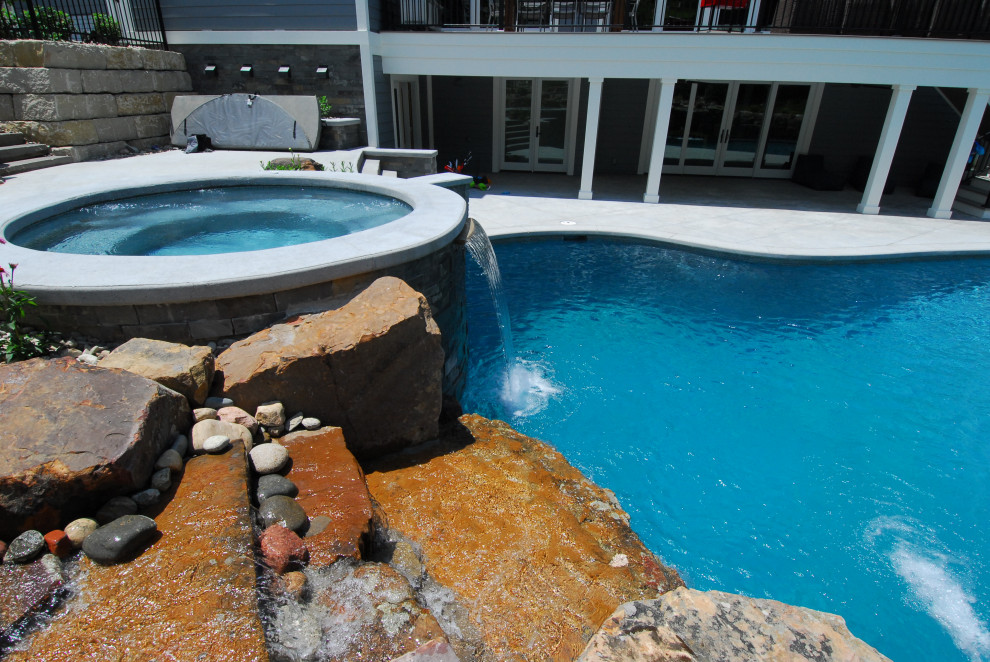 Waterfall, slide, hot tub, beautiful pool! Pools Kansas City von