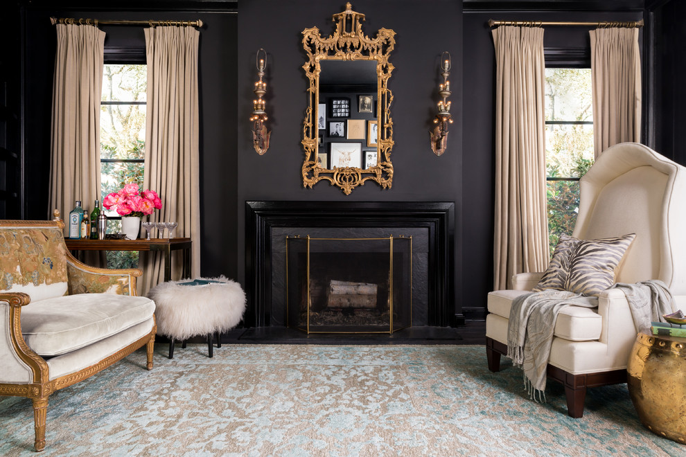 Design ideas for a traditional living room in Dallas with black walls and a standard fireplace.