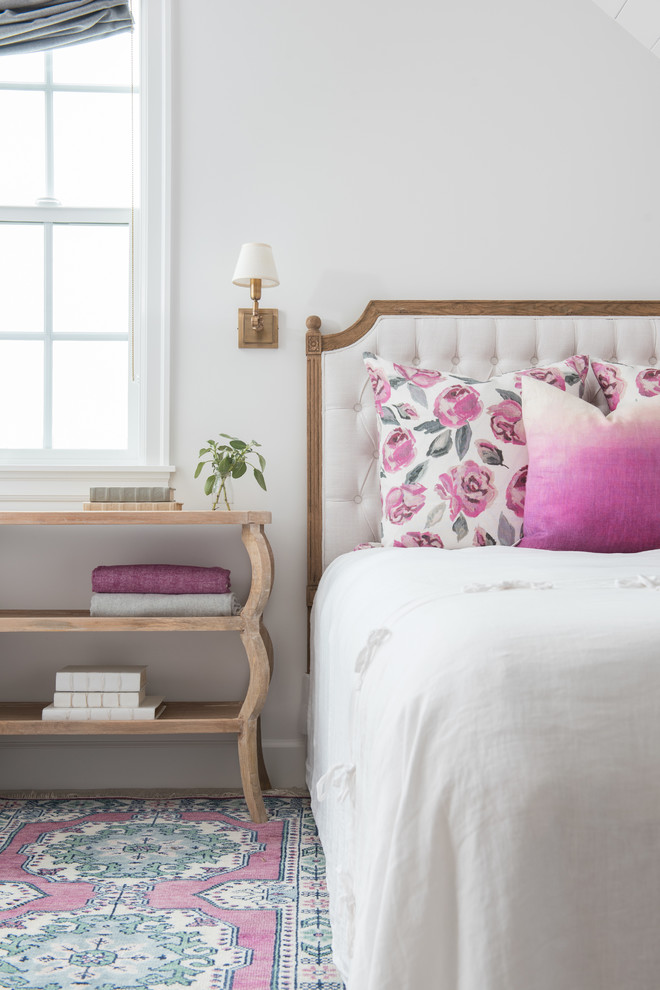 Example of a mid-sized transitional medium tone wood floor and brown floor bedroom design in Portland with gray walls