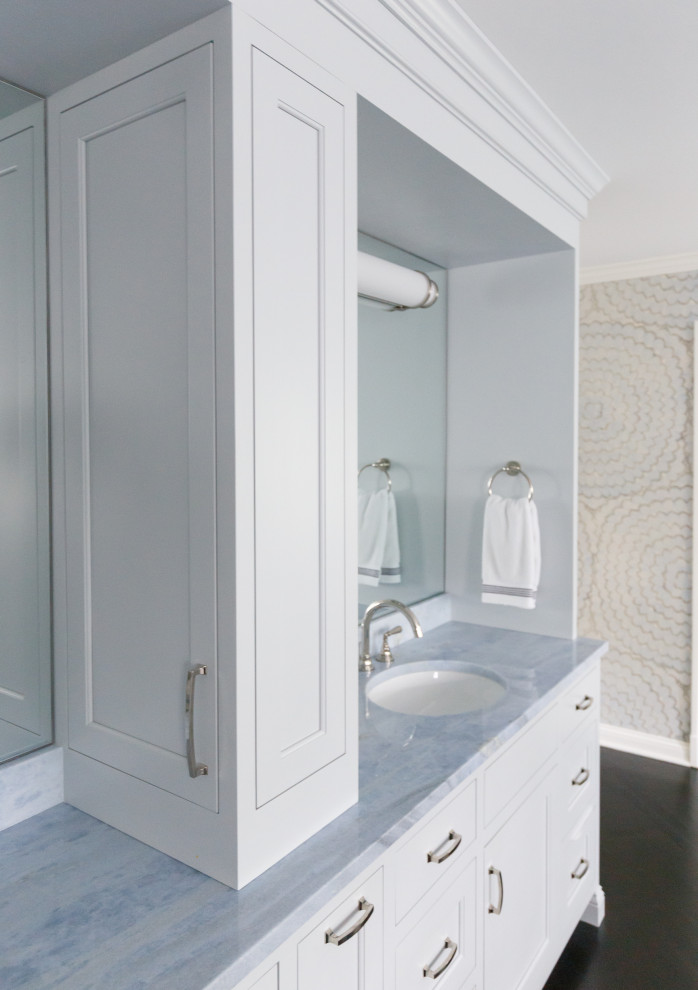 Photo of an expansive transitional master bathroom in New York with recessed-panel cabinets, grey cabinets, a freestanding tub, a double shower, marble benchtops, a hinged shower door, blue benchtops, a double vanity and a built-in vanity.