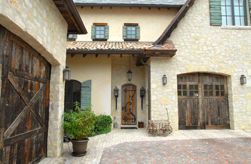 Inspiration for a mediterranean attached one-car garage in Salt Lake City.