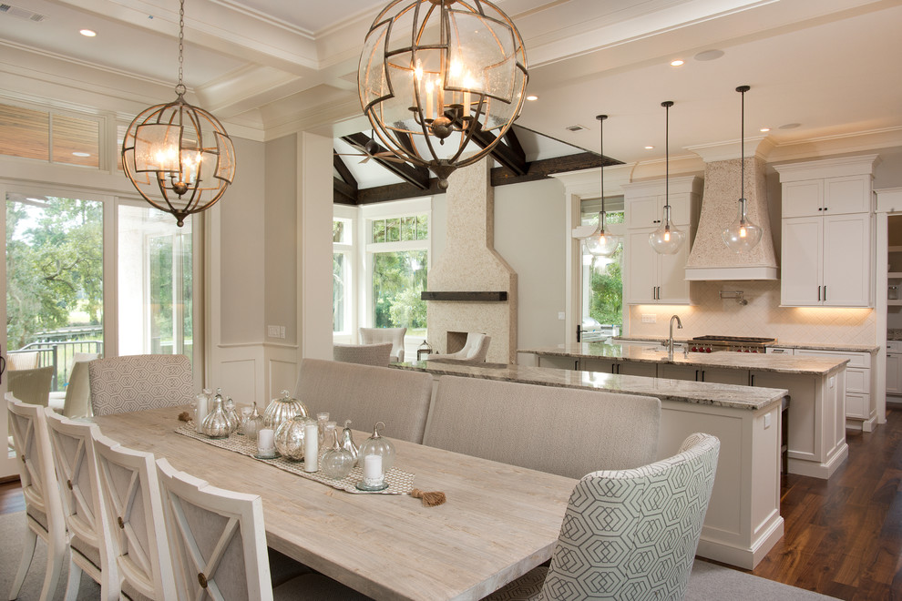 Large transitional eat-in kitchen in Atlanta with a farmhouse sink, shaker cabinets, white cabinets, granite benchtops, beige splashback, ceramic splashback, stainless steel appliances, medium hardwood floors and with island.