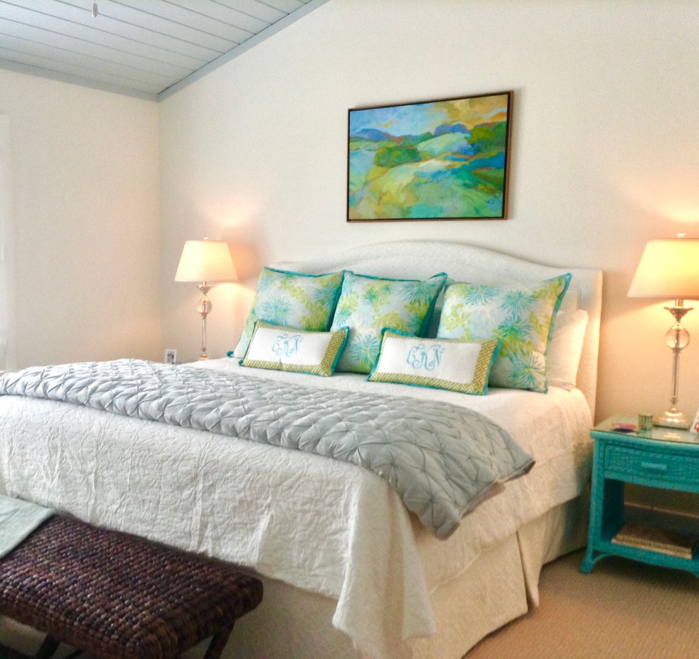 Photo of a mid-sized beach style master bedroom in Raleigh with white walls, carpet and no fireplace.