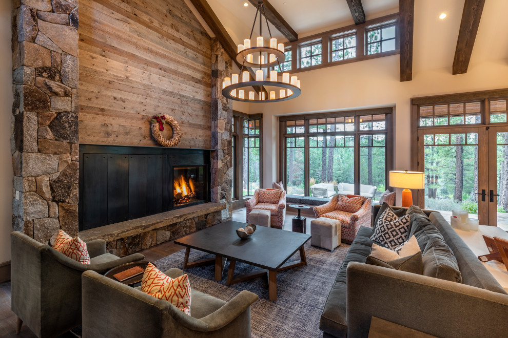 Country living room in Phoenix with vaulted and wood walls.