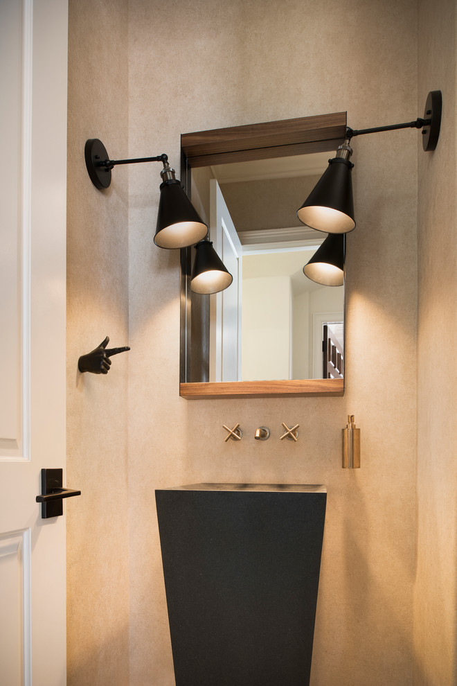 This is an example of a small contemporary powder room in Orlando with a two-piece toilet, beige tile, stone tile, beige walls, a pedestal sink and zinc benchtops.