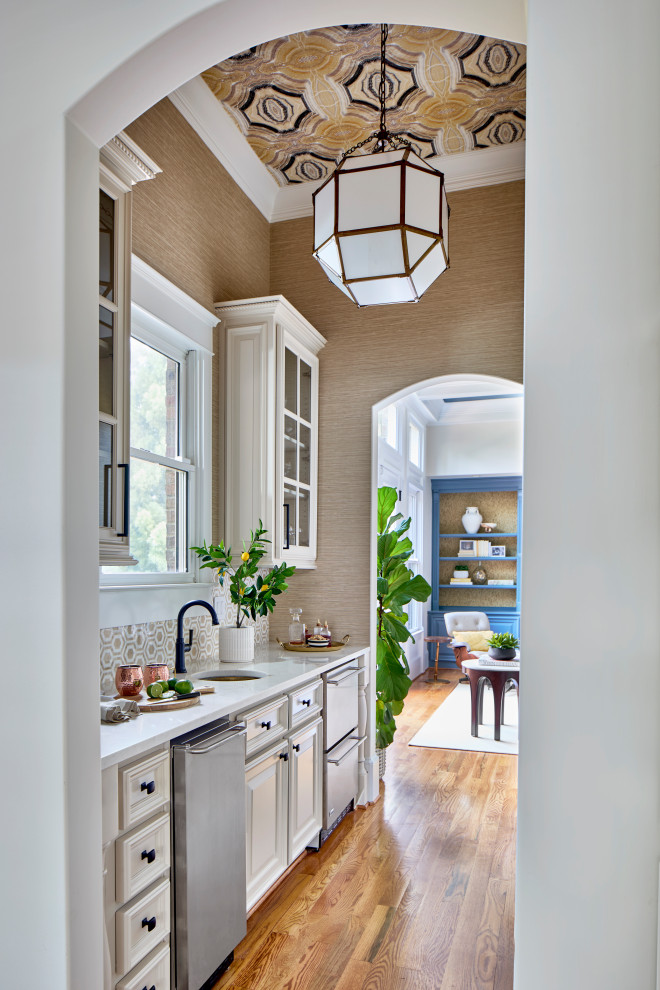 Inspiration for a transitional home bar remodel in Atlanta