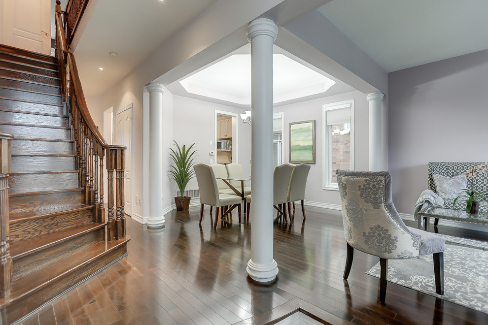 Example of a transitional home design design in Toronto