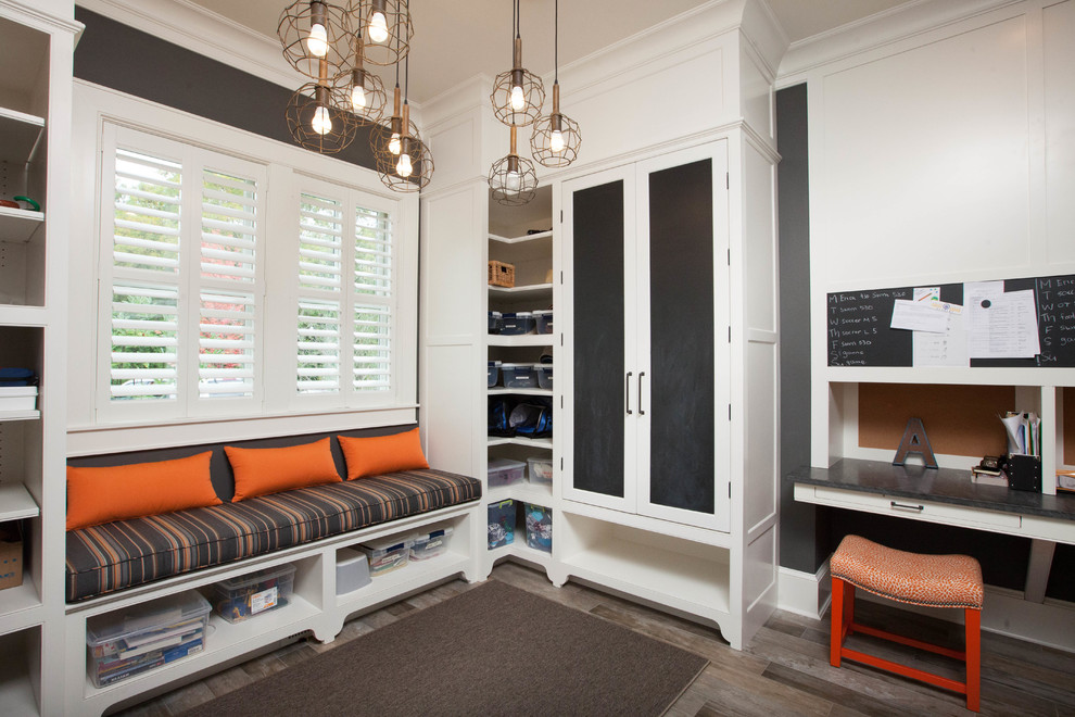This is an example of a transitional gender-neutral kids' room in Bridgeport with grey walls, dark hardwood floors and brown floor.